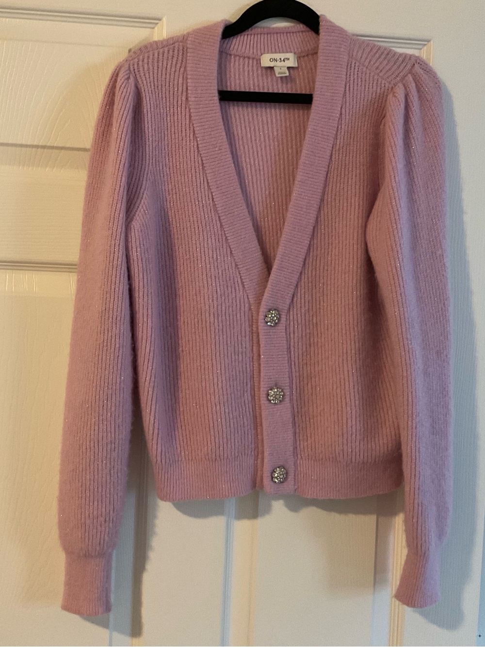 On 3/4™ Lilac Ribbed V-Neck Cardigan with Decorative Rhinestone Buttons